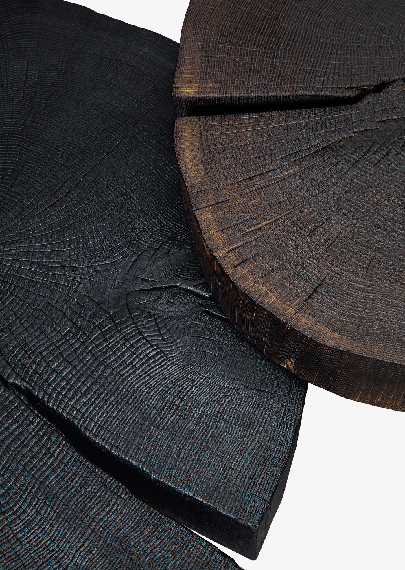 janua beistelltisch bc 05 stomp eiche geköhlt ton schwarz, höhe 28cm, massive baumscheibe auf filigranem metall, detailfoto